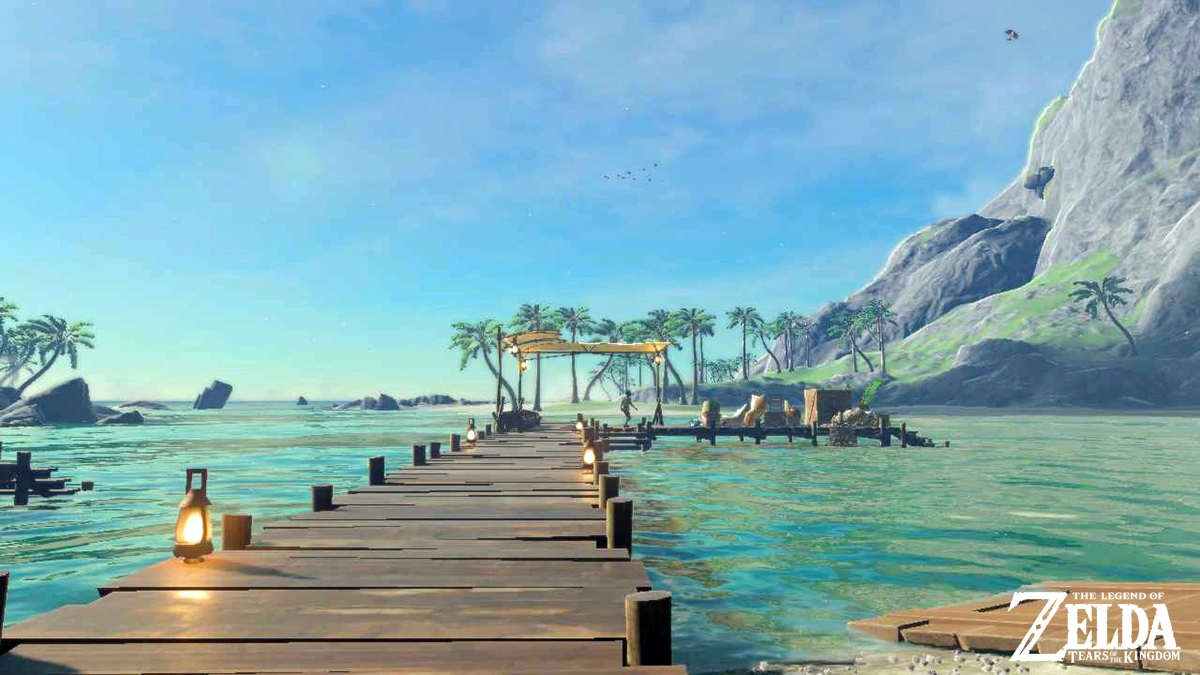 The wooden dock of Lurelin Village, offering a tranquil view of the sea in Tears of the Kingdom.